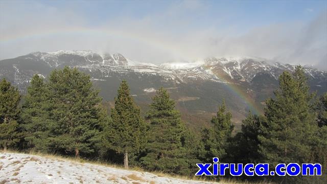 Arco iris delante de la Tosa d'Alp y el Coll de Pal